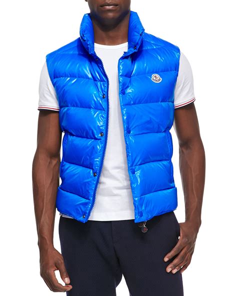 bright blue puffer vest.